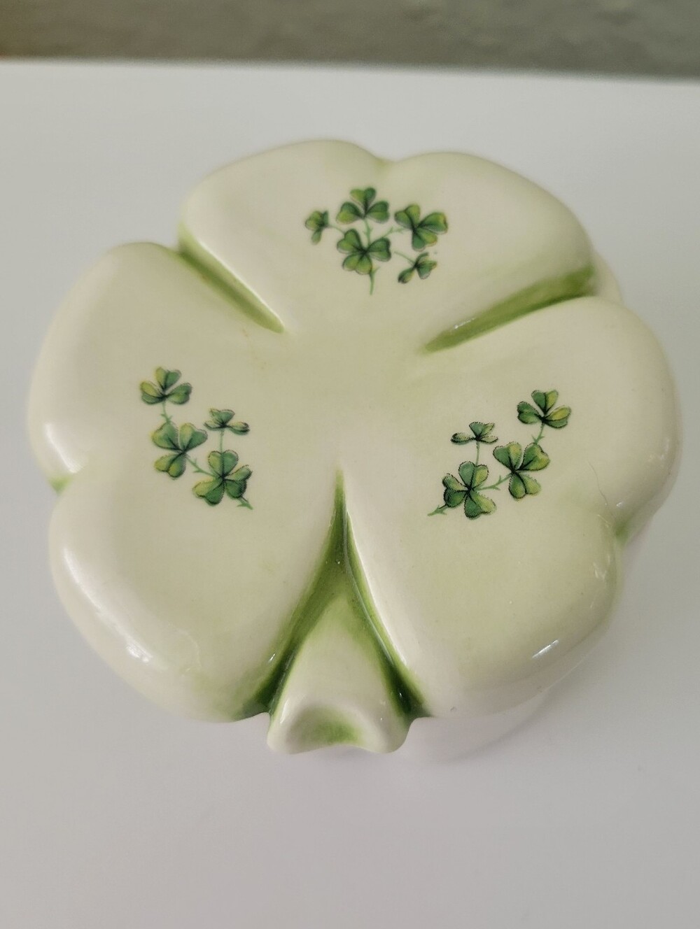 Vintage Shamrock shaped ceramic trinket box with green shamrock designs 2.5"